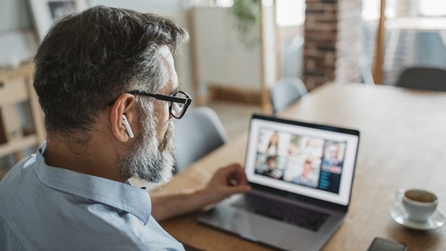 man looking at screen