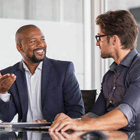 two business men talking