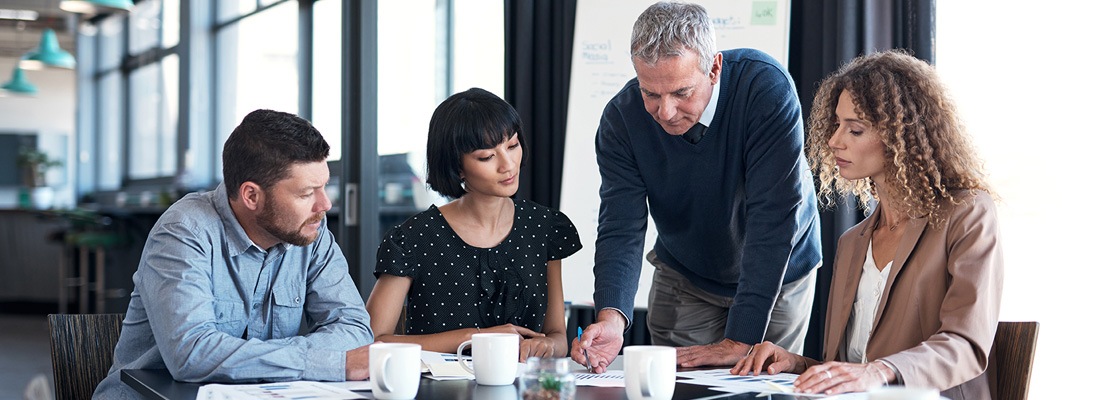 Business People Sitting at table